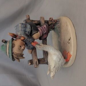 Goebel Boy on Fence with Duck